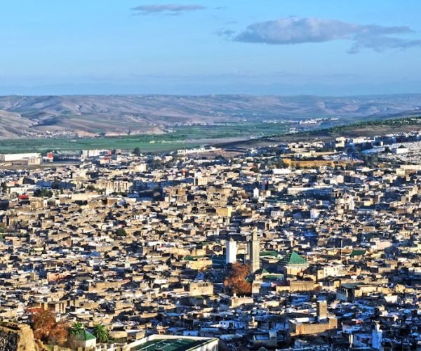 Aerial view of the historic cityscape of Fès in Morocco during daylight.