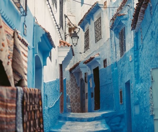 Explore the vibrant blue streets of Chefchaouen, Morocco's scenic medina.